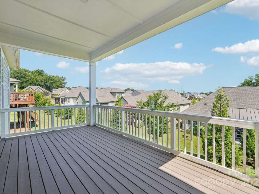 45528 Misty Bluff Drive, Charlotte, NC 28278.  MLS# CAR4285135, YatesRealty ID 31195. Back covered deck. on main level