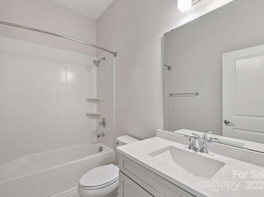 45528 Misty Bluff Drive, Charlotte, NC 28278.  MLS# CAR4285135, YatesRealty ID 31195. Guest bathroom on main level