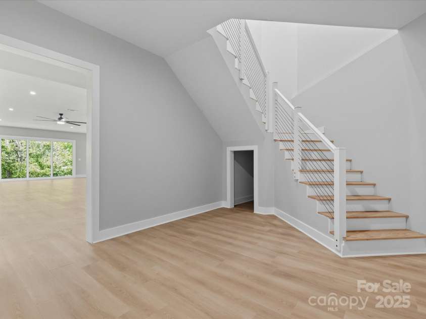 1070 Saddle Back Lane, Mooresville, NC 28115.  MLS# CAR4298516, YatesRealty ID 3120. Basement Stairwell