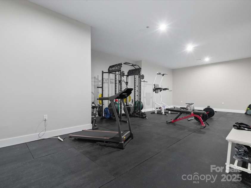 1070 Saddle Back Lane, Mooresville, NC 28115.  MLS# CAR4298516, YatesRealty ID 3120. Gym in Basement