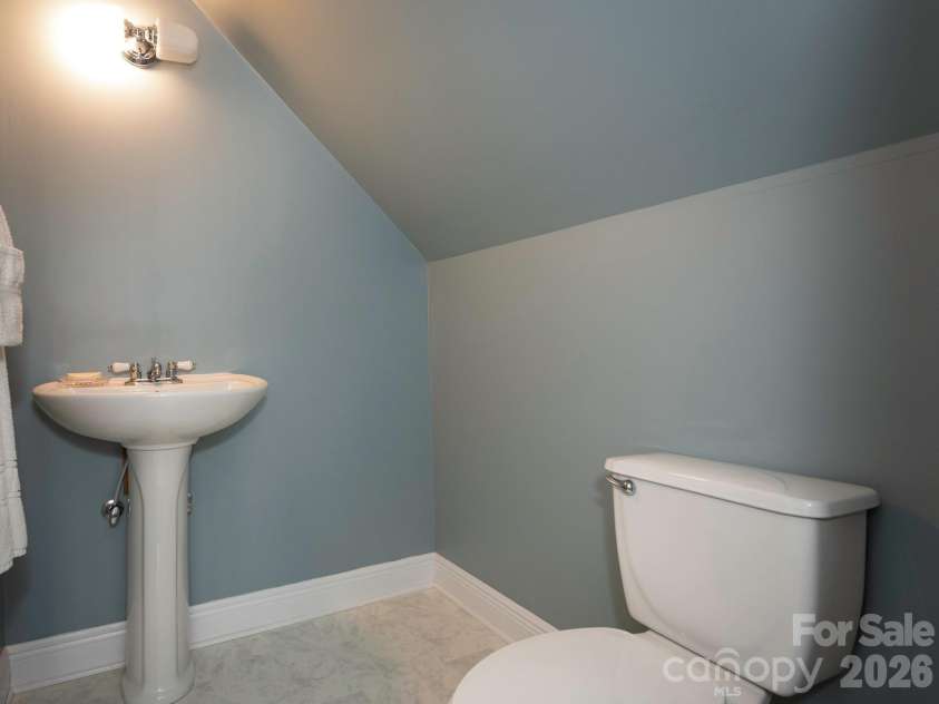 4440 Hucks Road, Charlotte, NC 28269.  MLS# CAR4375835, YatesRealty ID 31203. Half bath over the garage
