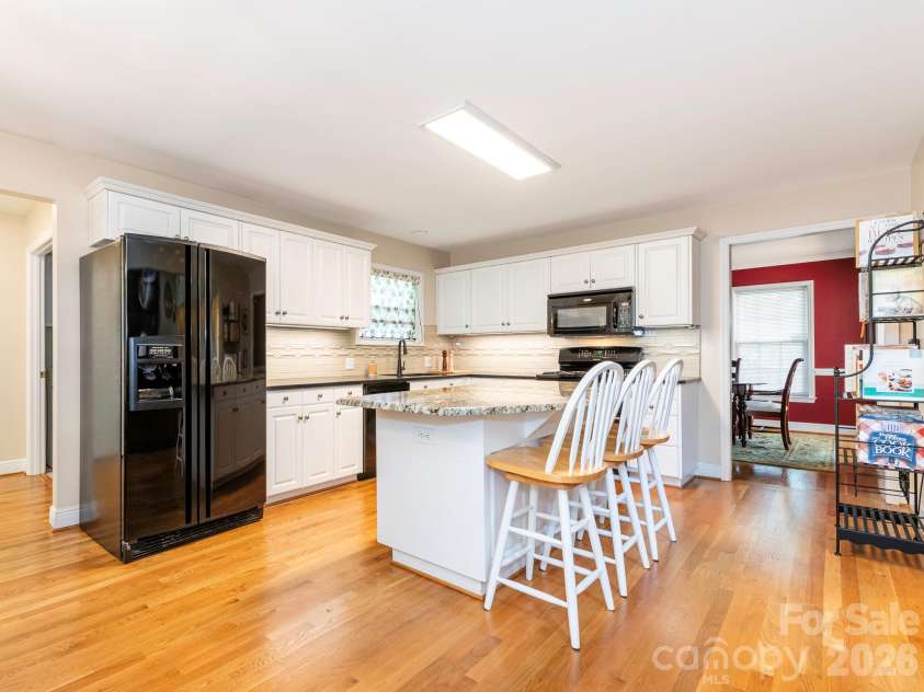 4440 Hucks Road, Charlotte, NC 28269.  MLS# CAR4375835, YatesRealty ID 31203. Kitchen has granite counter tops