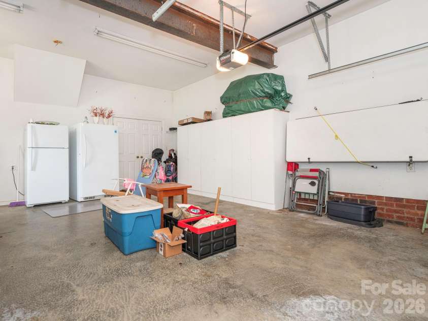 4440 Hucks Road, Charlotte, NC 28269.  MLS# CAR4375835, YatesRealty ID 31203. Large 2-car garage with additional storage closet