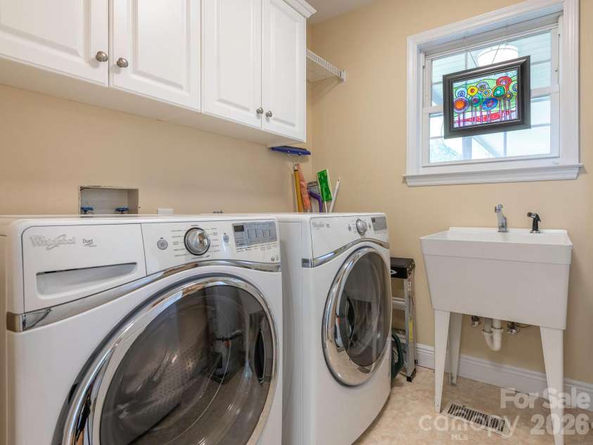 4440 Hucks Road, Charlotte, NC 28269.  MLS# CAR4375835, YatesRealty ID 31203. Laundry room on the main level
