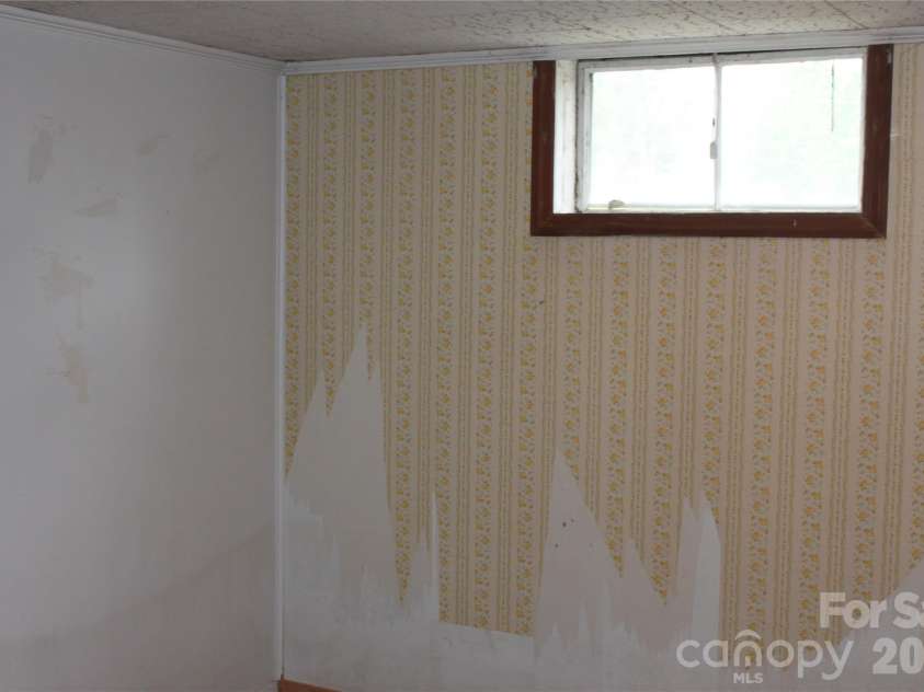 507 Dakota Street, Kannapolis, NC 28083.  MLS# CAR4382627, YatesRealty ID 31204. BASEMENT ROOM