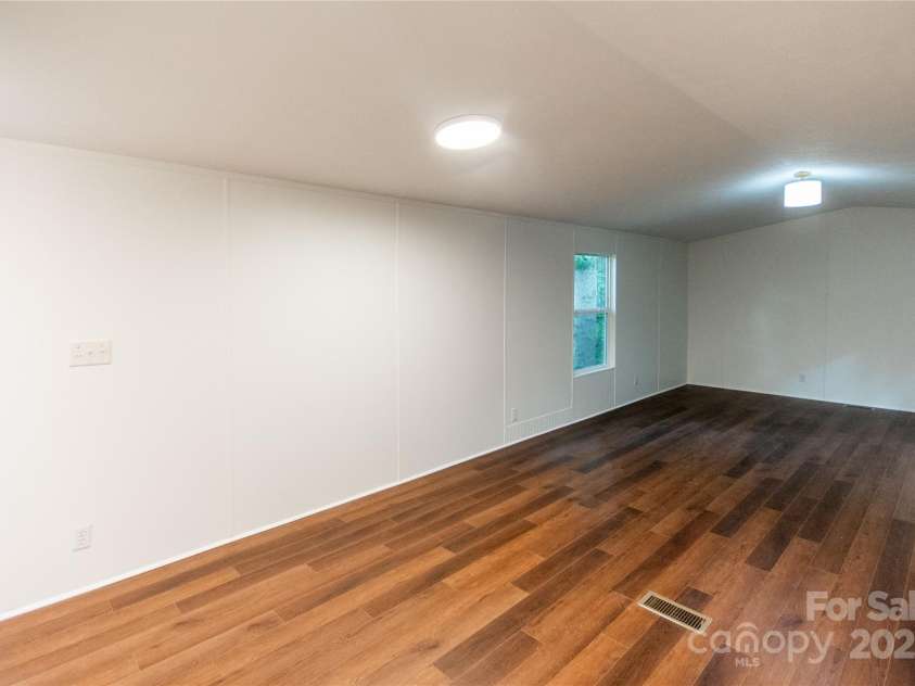 40 Pat Rogers Road, Franklin, NC 28734.  MLS# CAR4282169, YatesRealty ID 31209. Primary bedroom