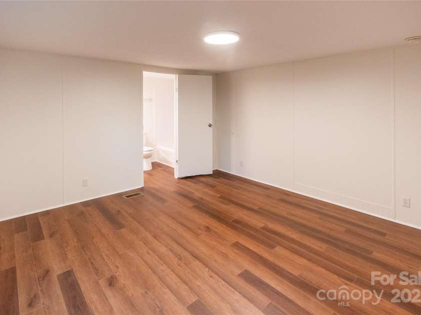 40 Pat Rogers Road, Franklin, NC 28734.  MLS# CAR4282169, YatesRealty ID 31209. Primary bedroom