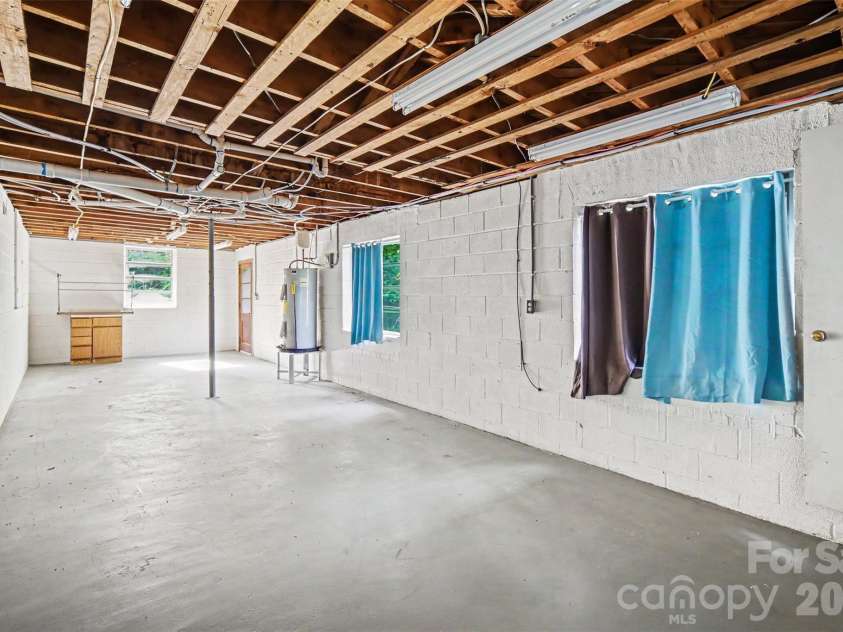1003 Sumter Street, Shelby, NC 28150.  MLS# CAR4394841, YatesRealty ID 31211. Basement workshop