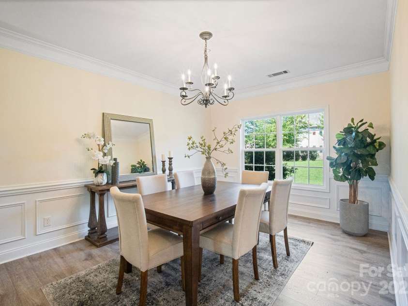 16010 Loch Raven Road, Huntersville, NC 28078.  MLS# CAR4277329, YatesRealty ID 31214. Formal dining room leading to kitchen area