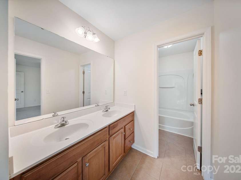 16010 Loch Raven Road, Huntersville, NC 28078.  MLS# CAR4277329, YatesRealty ID 31214. Shared jack and jill back for the 3rd and 4th bedrooms