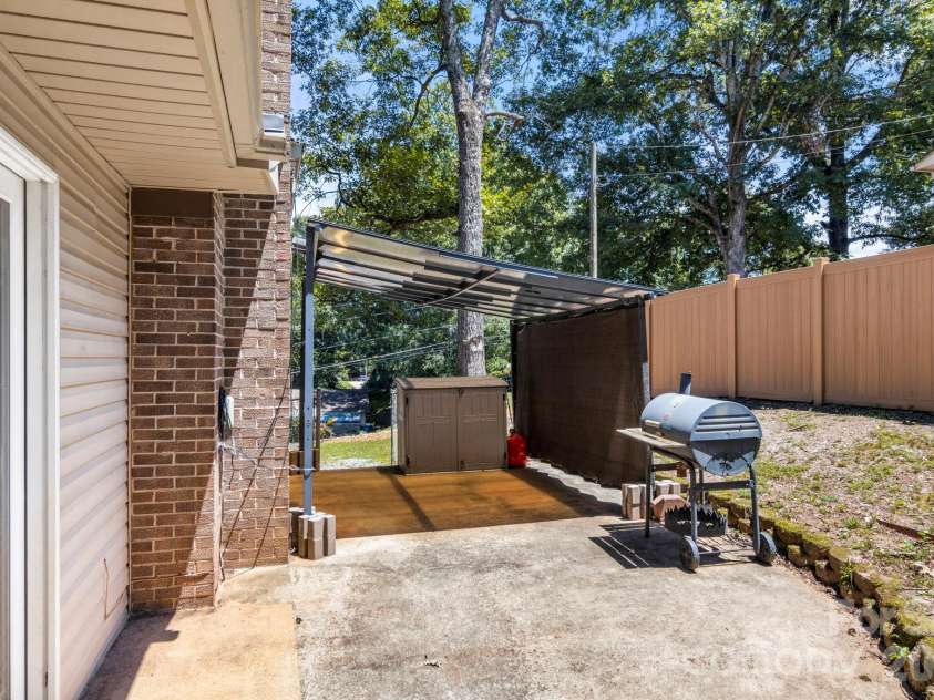 2951 7th Street Drive, Hickory, NC 28601.  MLS# CAR4391431, YatesRealty ID 31215. Side Patio area