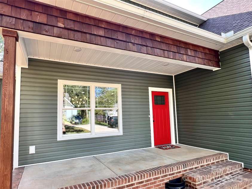 123 Arrowood Lane, Harmony, NC 28634.  MLS# CAR4285616, YatesRealty ID 31220. Front porch