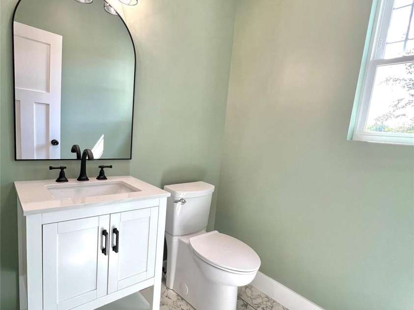 123 Arrowood Lane, Harmony, NC 28634.  MLS# CAR4285616, YatesRealty ID 31220. Powder room