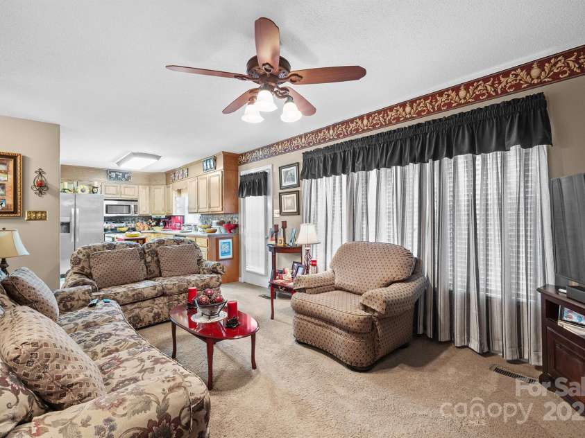1948 Twin Ponds Drive, Hickory, NC 28602.  MLS# CAR4285877, YatesRealty ID 31228. Living Room View 1
