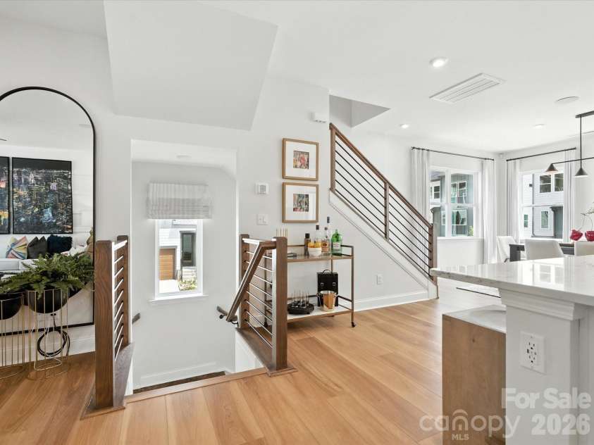 7937 Cedarsmith Court, Charlotte, NC 28217.  MLS# CAR4395047, YatesRealty ID 31235. End unit windows adding natural light to stairs and dining space