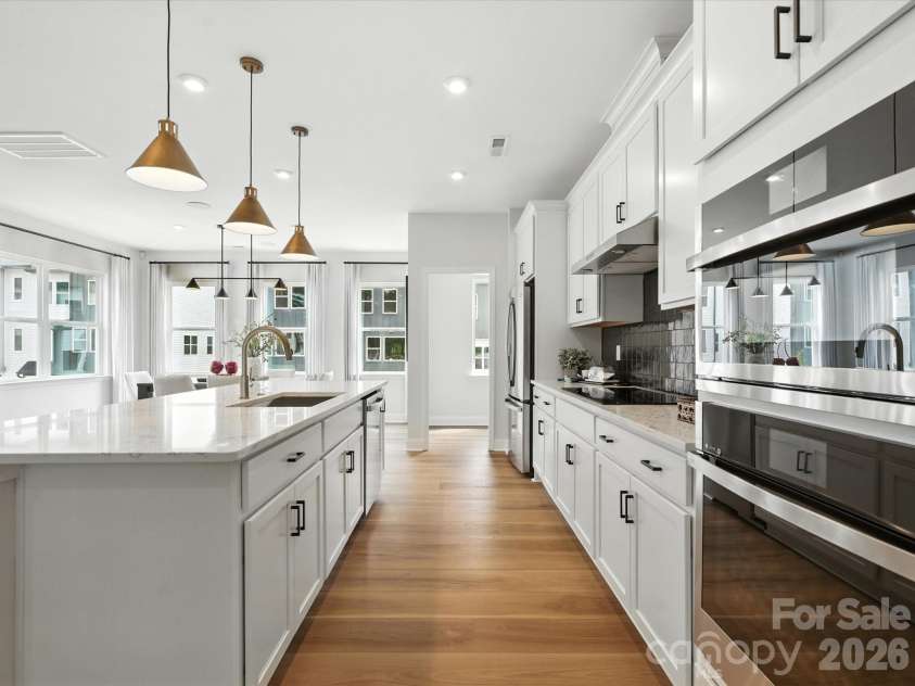 7937 Cedarsmith Court, Charlotte, NC 28217.  MLS# CAR4395047, YatesRealty ID 31235. Gourmet kitchen with large island with added storage