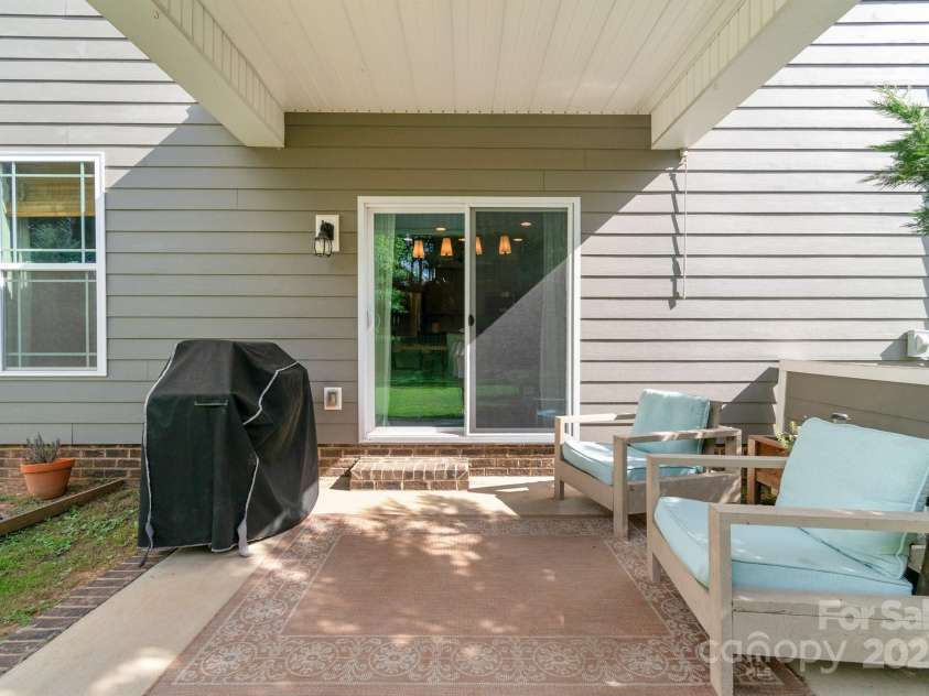 1016 Burton Point Court, Waxhaw, NC 28173.  MLS# CAR4281237, YatesRealty ID 31237. Covered patio