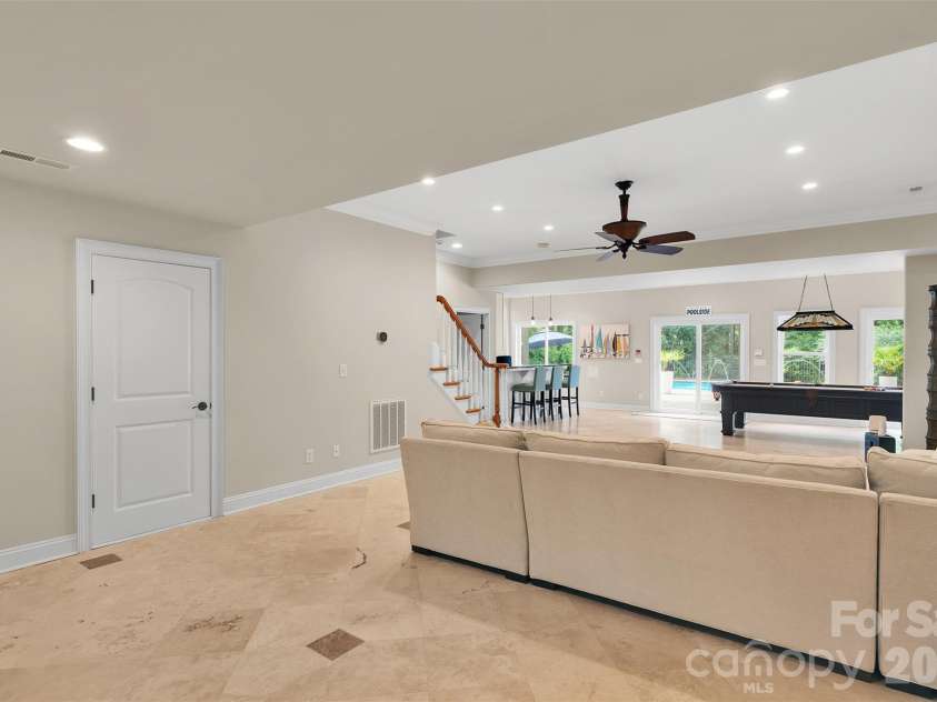 4552 Sawgrass Court, Denver, NC 28037.  MLS# CAR4394088, YatesRealty ID 31238. Lower Living Room
