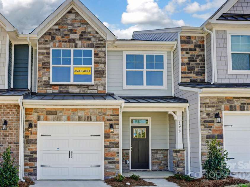 6275 Tea Olive Drive, Harrisburg, NC 28075.  MLS# CAR4235850, YatesRealty ID 31245. Homesite 176 is an Ashland K middle-unit floorplan.
