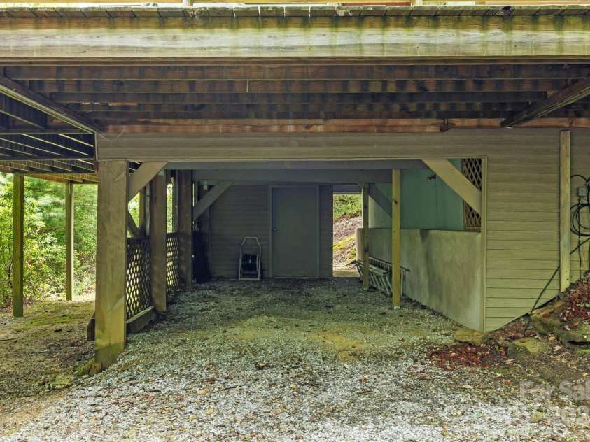 571 Tsisqua Circle, Brevard, NC 28712.  MLS# CAR4290327, YatesRealty ID 31248. Room for One Car underneath