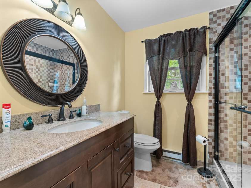 5 Granite Drive, Hendersonville, NC 28792.  MLS# CAR4266478, YatesRealty ID 31249. Hall bath.