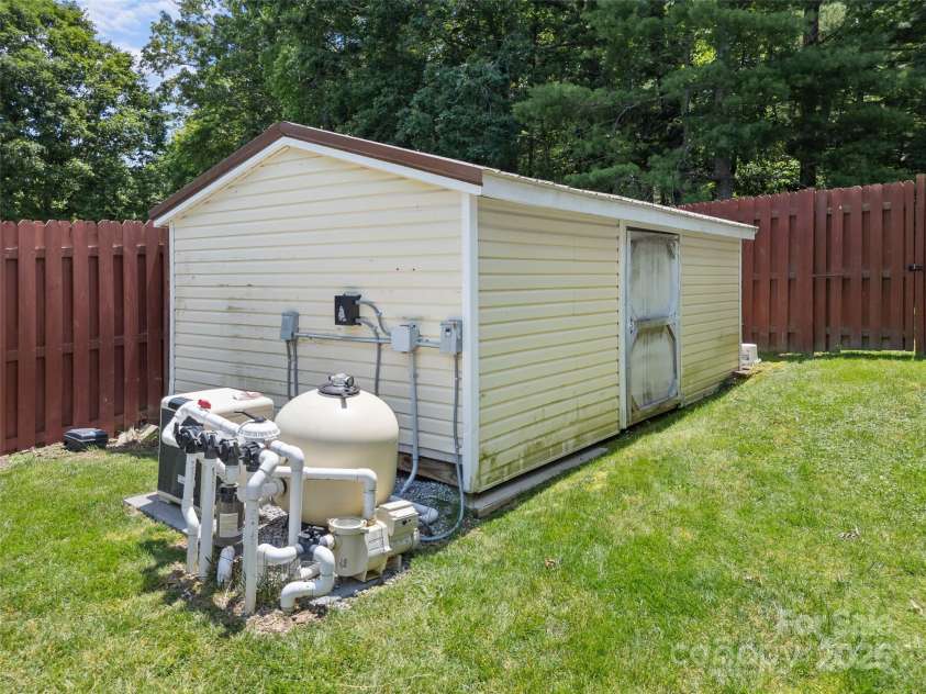 5 Granite Drive, Hendersonville, NC 28792.  MLS# CAR4266478, YatesRealty ID 31249. Pool pumphouse