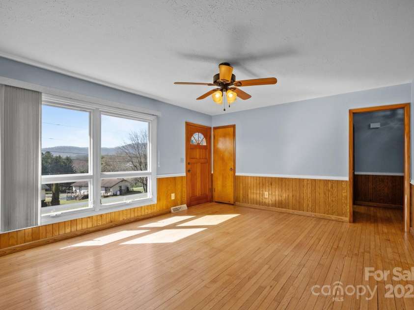 100 Young Drive, Candler, NC 28715.  MLS# CAR4230745, YatesRealty ID 3125. Dining room to the bedrooms