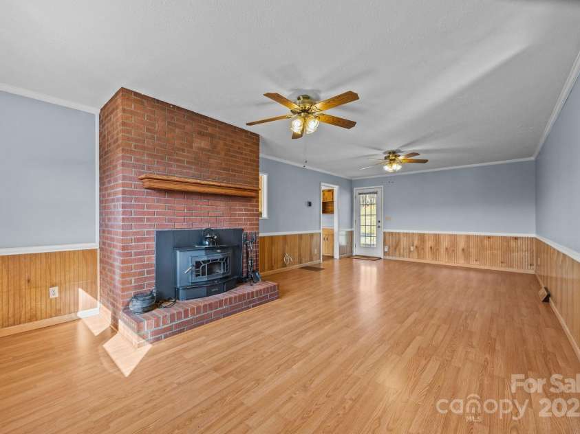 100 Young Drive, Candler, NC 28715.  MLS# CAR4230745, YatesRealty ID 3125. Great room