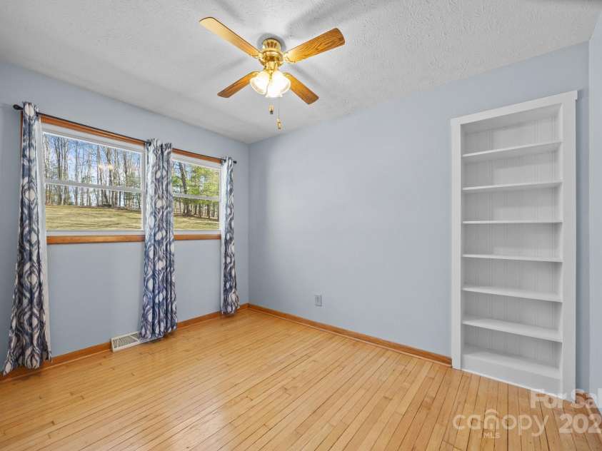 100 Young Drive, Candler, NC 28715.  MLS# CAR4230745, YatesRealty ID 3125. Home office with built in shelves