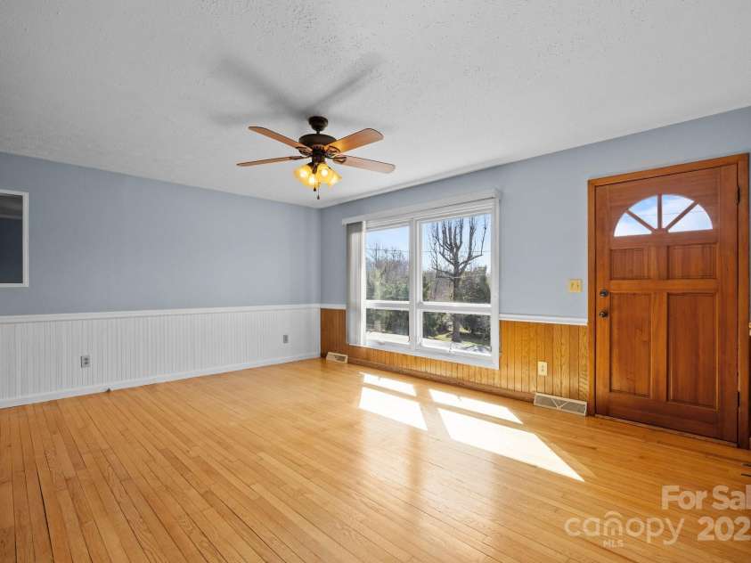 100 Young Drive, Candler, NC 28715.  MLS# CAR4230745, YatesRealty ID 3125. Picture window in the dining room view of Mt. Pisgah