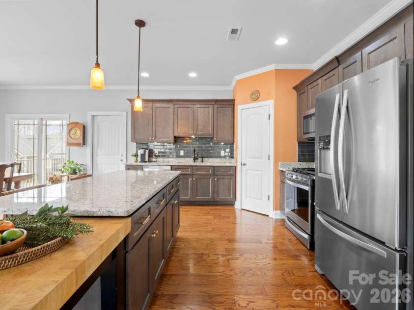 614 Downing Way, Landrum, SC 29356.  MLS# CAR4349559, YatesRealty ID 3125. Kitchen has loads of storage and a gas range