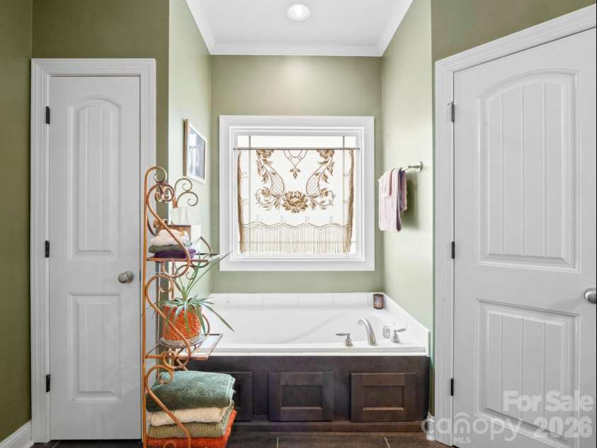 614 Downing Way, Landrum, SC 29356.  MLS# CAR4349559, YatesRealty ID 3125. Linen closet on the left and a third walk-in closet on the right
