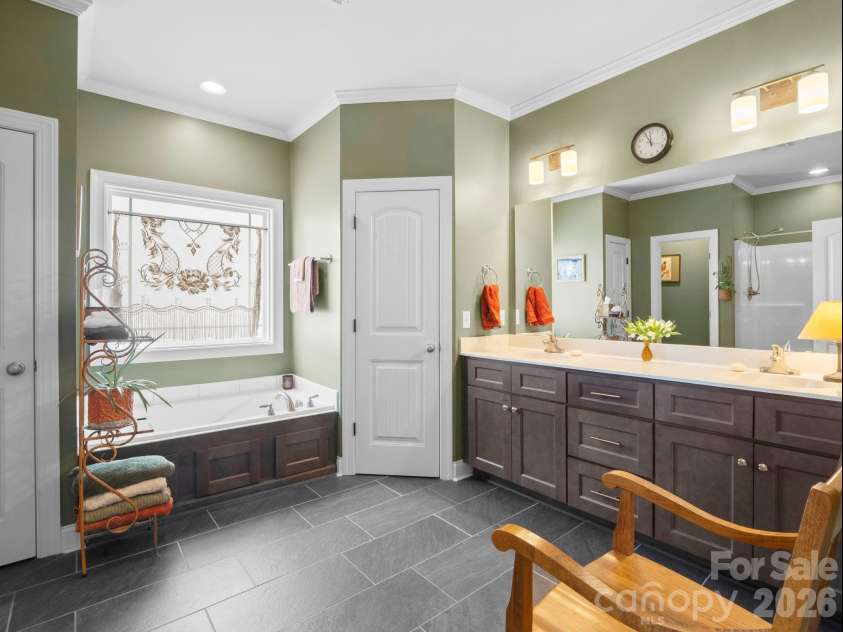 614 Downing Way, Landrum, SC 29356.  MLS# CAR4349559, YatesRealty ID 3125. Primary bathroom has a soaking tub plus a shower