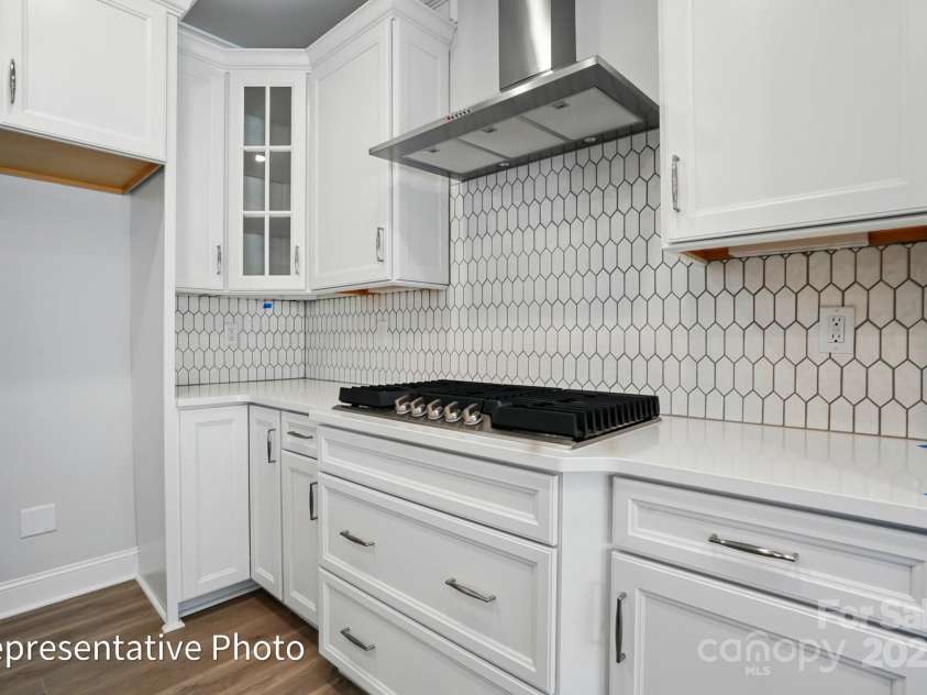 155 Prestwick Way, Mooresville, NC 28115.  MLS# CAR4286540, YatesRealty ID 31252. Gas Cooktop with Designer Range Hood