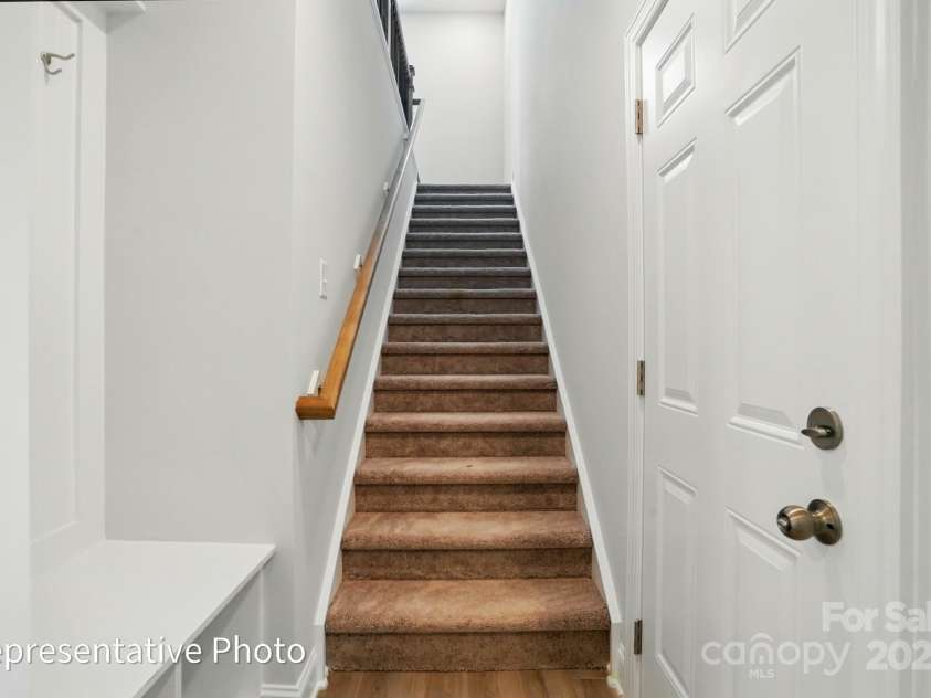 155 Prestwick Way, Mooresville, NC 28115.  MLS# CAR4286540, YatesRealty ID 31252. Stairs to second floor