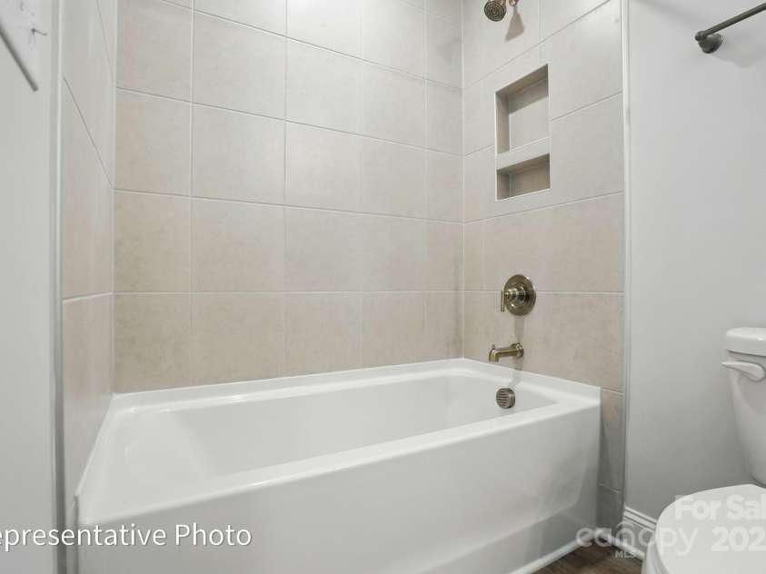 155 Prestwick Way, Mooresville, NC 28115.  MLS# CAR4286540, YatesRealty ID 31252. Upstairs includes a loft, bedroom and full bath