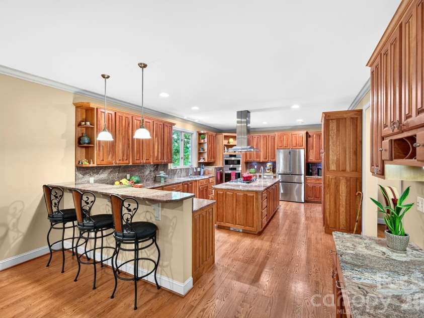 25 Whitaker View Road, Fairview, NC 28730.  MLS# CAR4394888, YatesRealty ID 31252. Breakfast Bar and Oversized Island