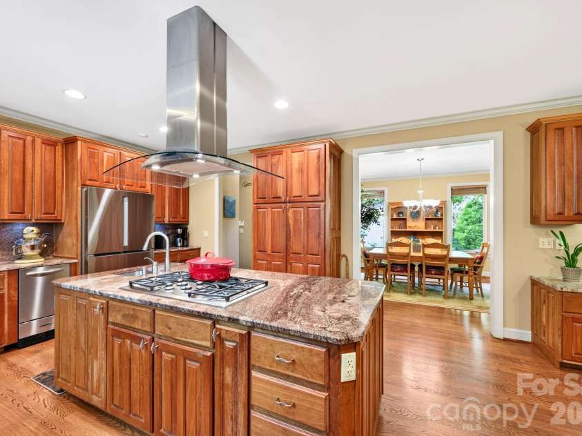 25 Whitaker View Road, Fairview, NC 28730.  MLS# CAR4394888, YatesRealty ID 31252. Island Includes Vegetable Sink and Storage