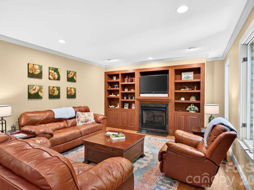 25 Whitaker View Road, Fairview, NC 28730.  MLS# CAR4394888, YatesRealty ID 31252. Living Room Includes Built-Ins