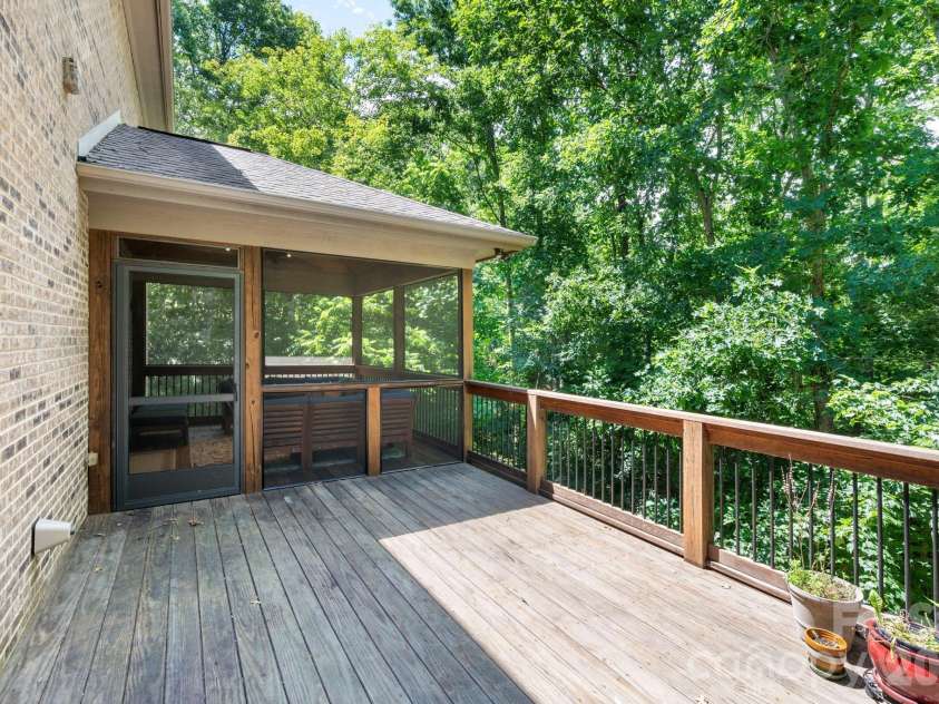 25 Whitaker View Road, Fairview, NC 28730.  MLS# CAR4394888, YatesRealty ID 31252. Open Deck Space as well as Screened-In Area