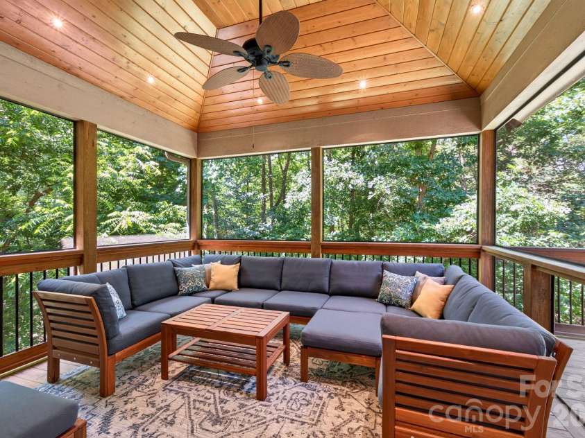 25 Whitaker View Road, Fairview, NC 28730.  MLS# CAR4394888, YatesRealty ID 31252. Screened-In Back Deck