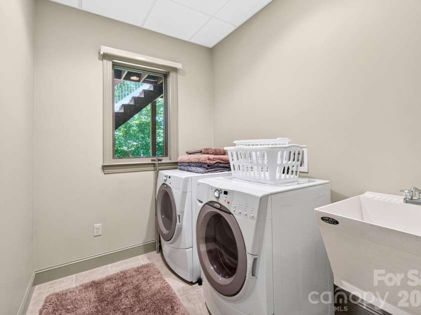 25 Whitaker View Road, Fairview, NC 28730.  MLS# CAR4394888, YatesRealty ID 31252. Second Laundry Room - All Washer/Dryers Convey