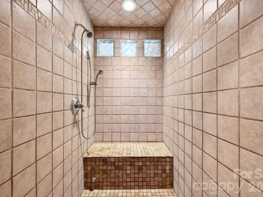 25 Whitaker View Road, Fairview, NC 28730.  MLS# CAR4394888, YatesRealty ID 31252. Tiled, Steam Walk-In Shower