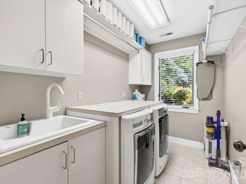 25 Whitaker View Road, Fairview, NC 28730.  MLS# CAR4394888, YatesRealty ID 31252. Two Laundry Rooms in Home