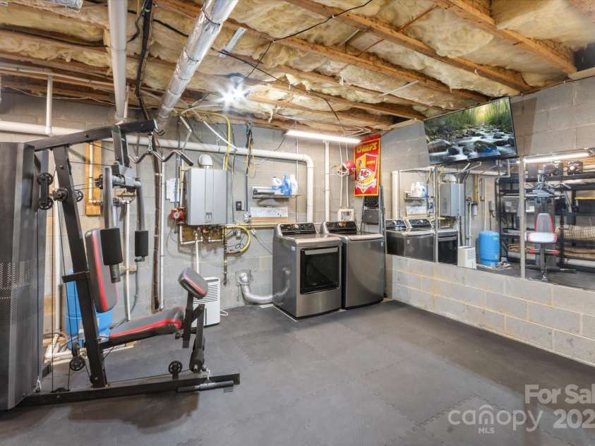 225 Calm Creek Road, Fletcher, NC 28732.  MLS# CAR4275540, YatesRealty ID 31254. 2nd washer and dryer located in basement