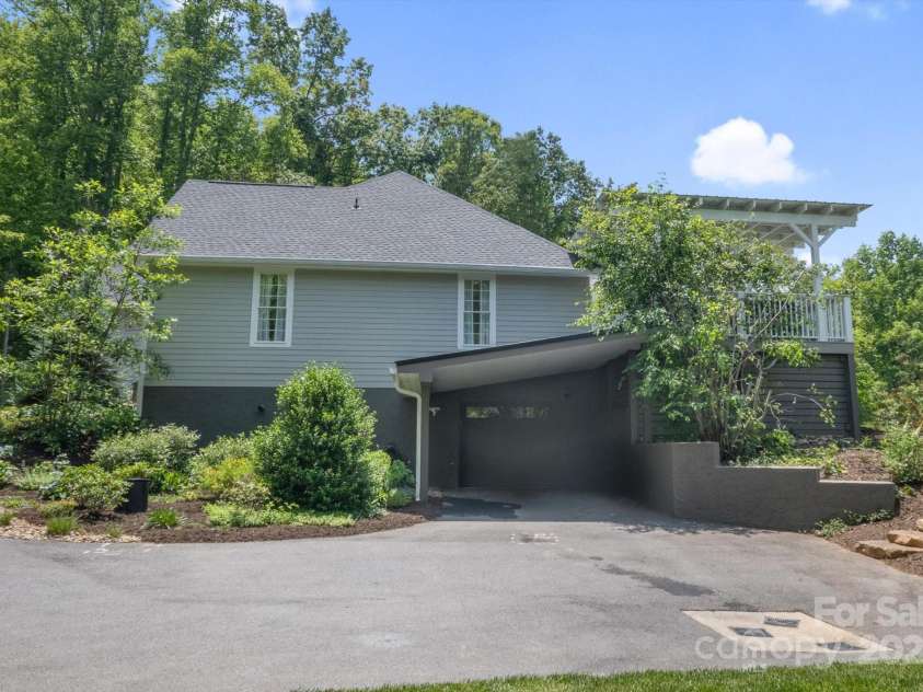 225 Calm Creek Road, Fletcher, NC 28732.  MLS# CAR4275540, YatesRealty ID 31254. 3rd garage space on basement level