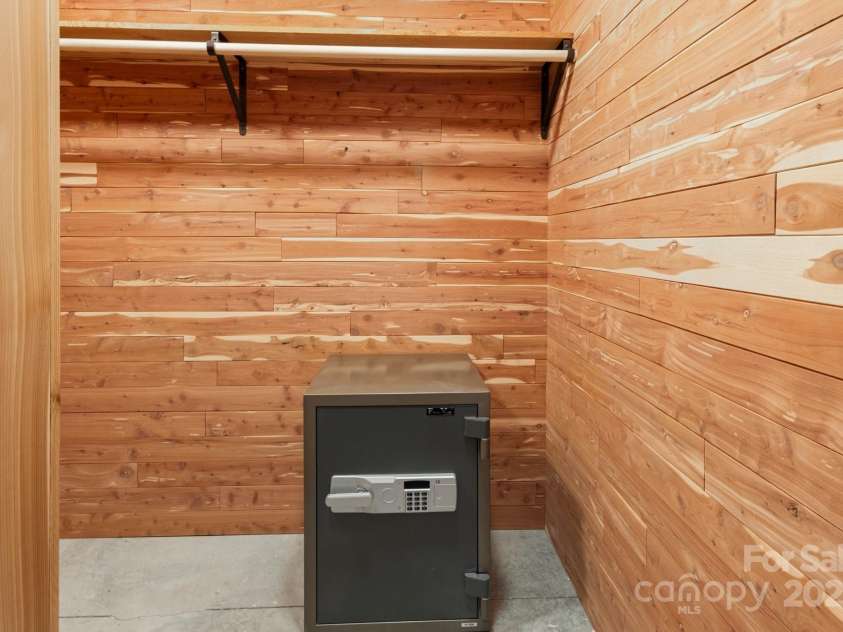 225 Calm Creek Road, Fletcher, NC 28732.  MLS# CAR4275540, YatesRealty ID 31254. Cedar closet with bolted down safe