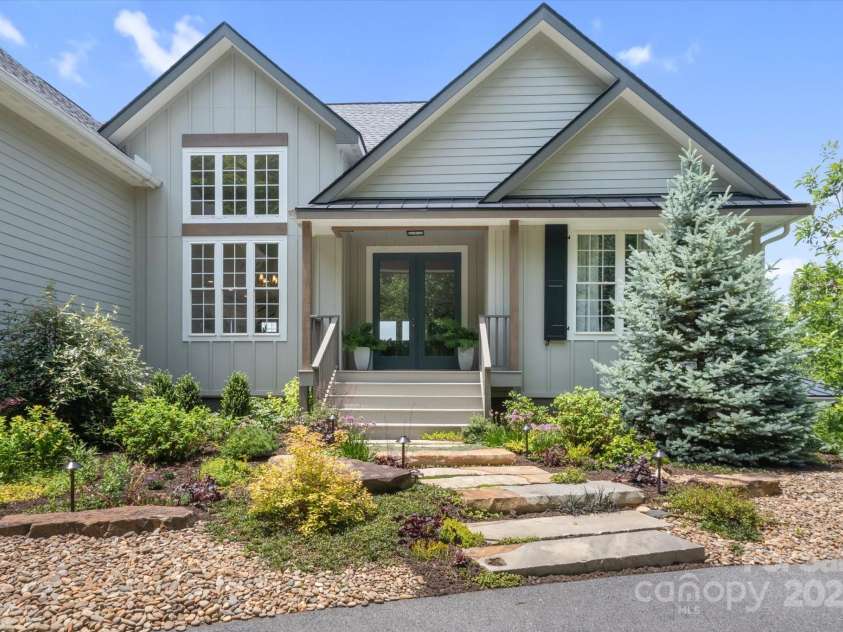 225 Calm Creek Road, Fletcher, NC 28732.  MLS# CAR4275540, YatesRealty ID 31254. Lovingly cared for landscaping and inviting stone walk way will be your guests first impression.