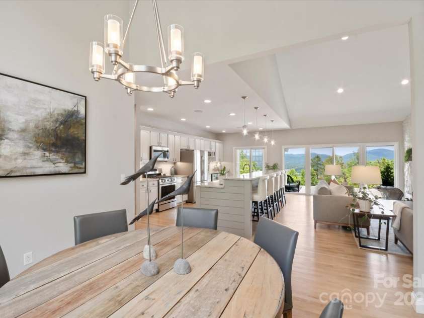 225 Calm Creek Road, Fletcher, NC 28732.  MLS# CAR4275540, YatesRealty ID 31254. Sight lines from dining to mountain ridge :)