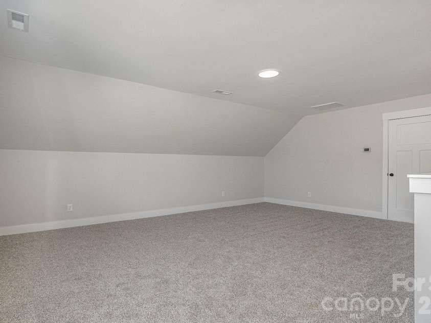 48 Tanseyleaf Drive, Smithfield, NC 27577.  MLS# CAR4394646, YatesRealty ID 31256. Upstairs Office/Loft/Flex room